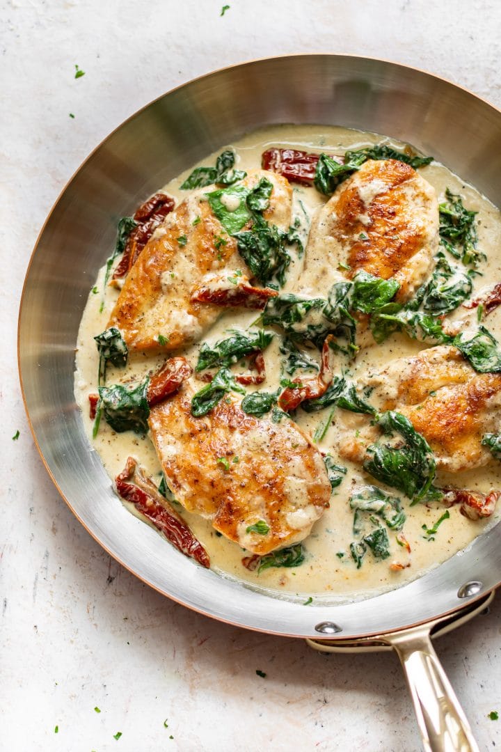 creamy Tuscan garlic chicken in a skillet