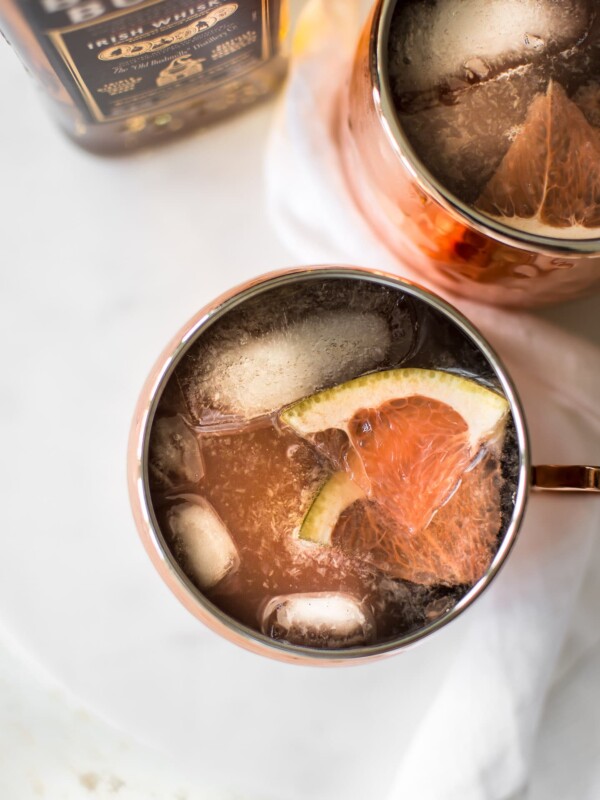 This grapefruit Irish Mule cocktail is a delicious variation of the classic Moscow Mule; it uses Irish whiskey instead of vodka. The perfect refreshing and easy to make party drink. Great for St. Patrick's Day or any day of the year. If you love ginger beer, you will love this cocktail!