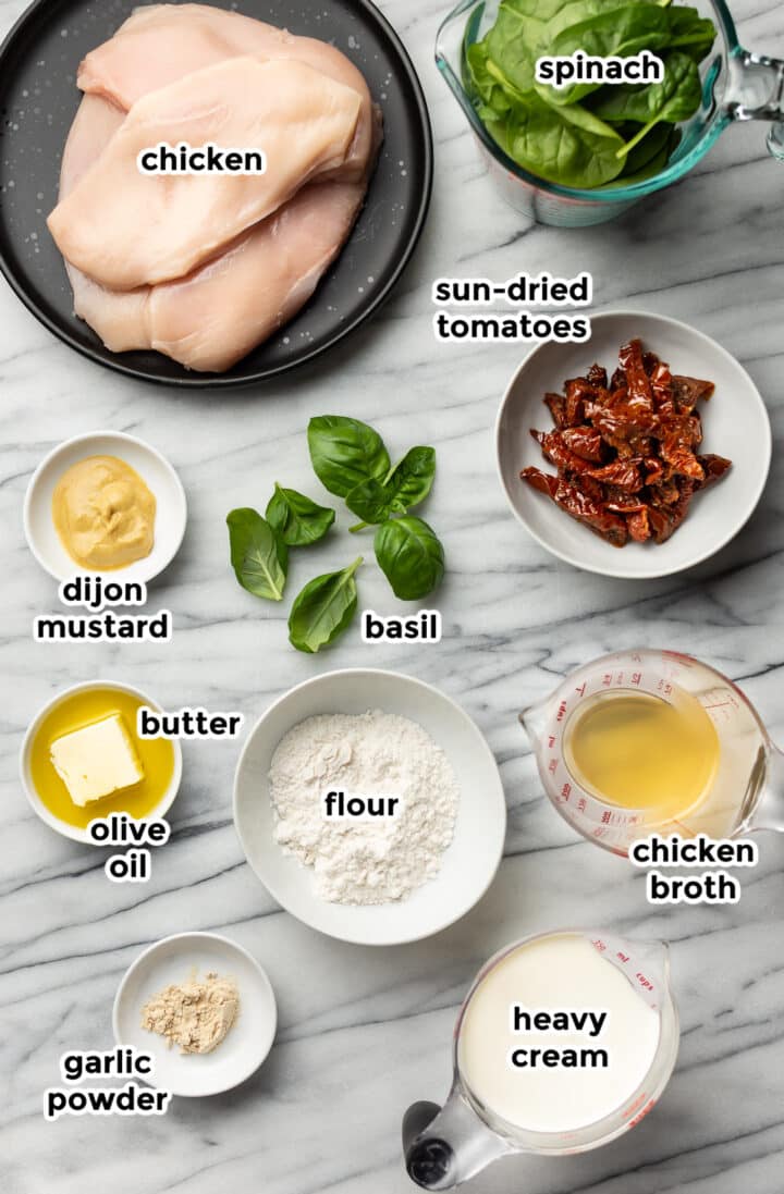 ingredients in prep bowls for creamy tuscan chicken