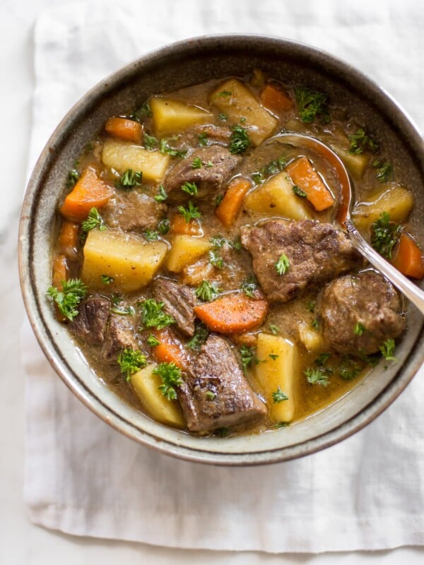 This Instant Pot Irish stew has tender beef, potatoes, carrots, and a delicious traditional Guinness sauce. You will love this simple stew recipe! It's perfect for St. Patrick's Day or any occasion where you want a comforting beef stew recipe. The electric pressure cooker makes this authentic recipe so easy to make. 