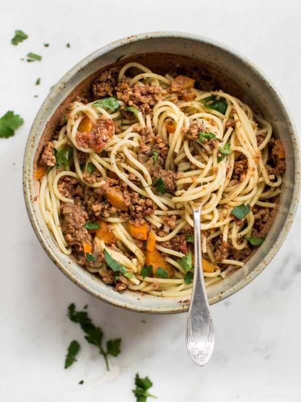 This healthy, quick, and hearty Instant Pot spaghetti sauce recipe makes a big batch perfect for freezing! This homemade tomato and meat sauce for pasta is sure to become a family favorite. A simple recipe from scratch. 