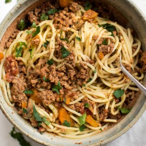 This healthy, quick, and hearty Instant Pot spaghetti sauce recipe makes a big batch perfect for freezing! This homemade tomato and meat sauce for pasta is sure to become a family favorite. A simple recipe from scratch. 