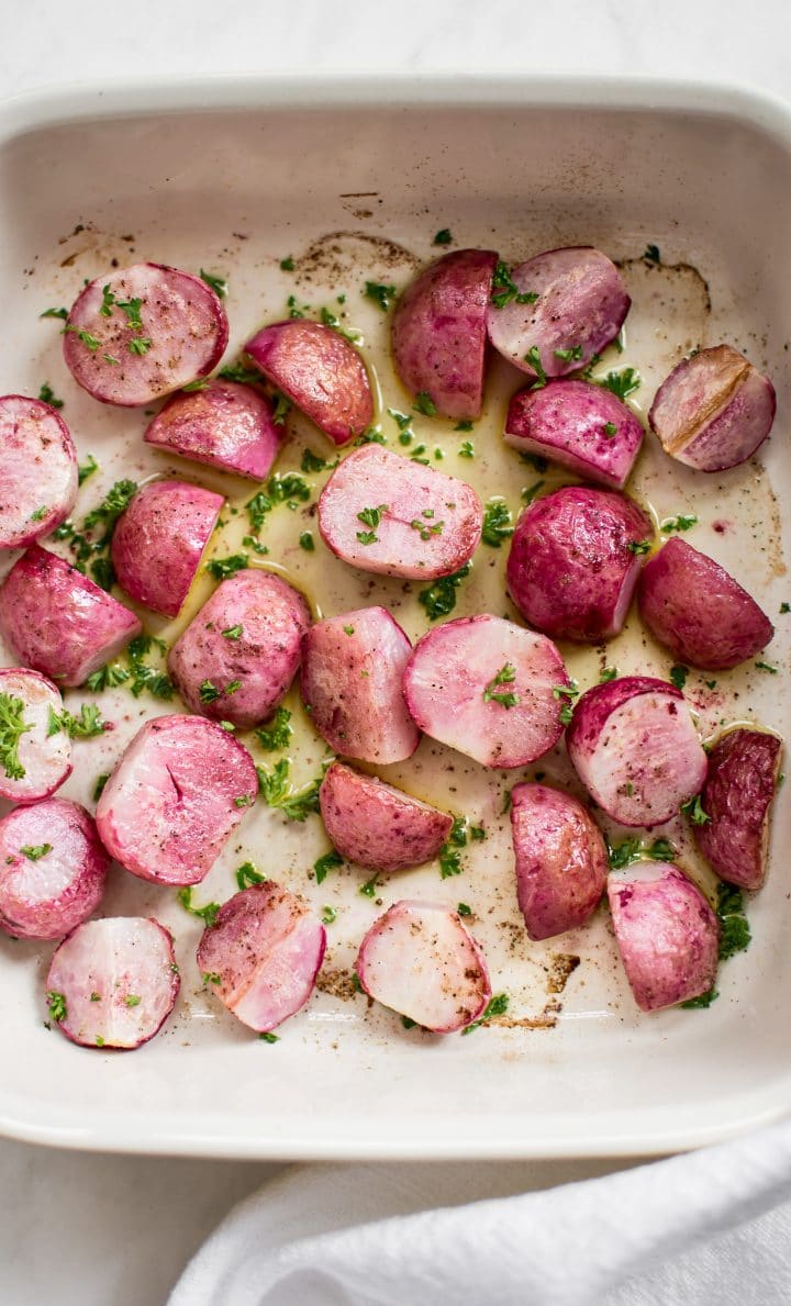 easy roasted radish halves in a baking dish