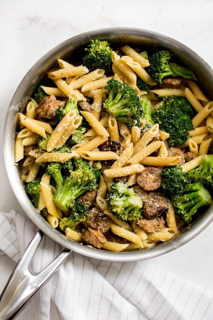 creamy Italian sausage and broccoli pasta in a skillet