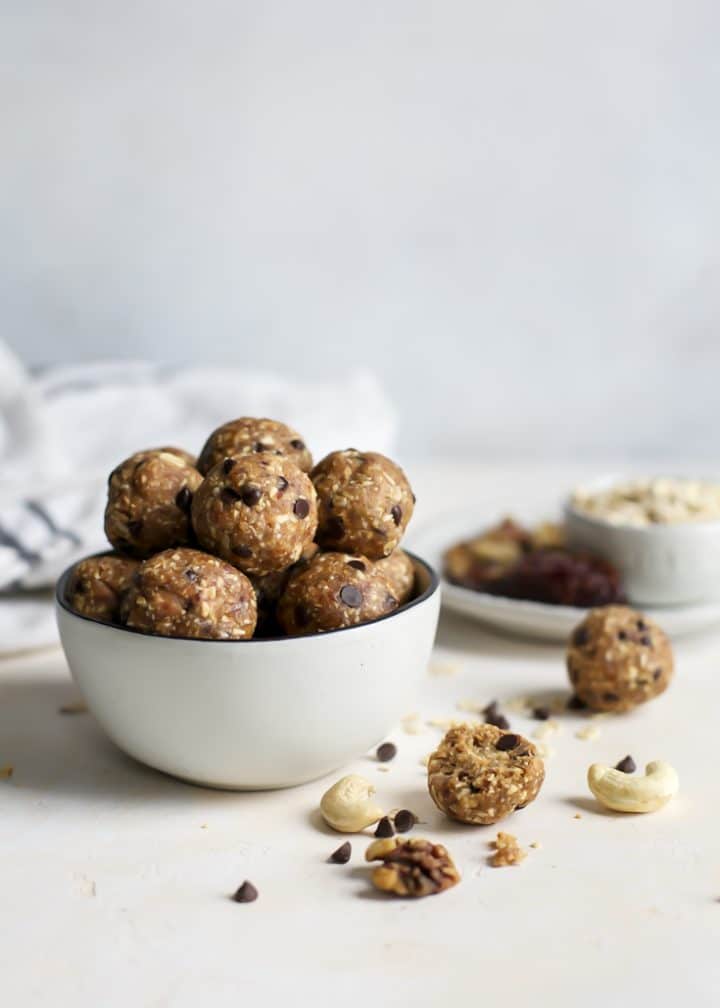 white bowl with several peanut butter energy balls