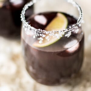 This easy black cherry margarita on the rocks recipe is the perfect refreshing summer drink for girls' night, parties, or backyard BBQs. A Cinco de Mayo favorite!