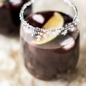 This easy black cherry margarita on the rocks recipe is the perfect refreshing summer drink for girls' night, parties, or backyard BBQs. A Cinco de Mayo favorite!