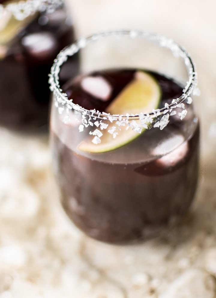 This easy black cherry margarita on the rocks recipe is the perfect refreshing summer drink for girls' night, parties, or backyard BBQs. A Cinco de Mayo favorite!