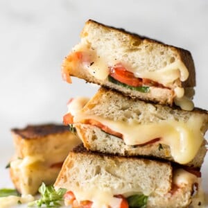 This gourmet Caprese grilled cheese sandwich is made with mayo instead of butter to get an ultra-crispy crust! This vegetarian recipe is quick, simple, and tasty comfort food. A healthier take on grilled cheese with tomatoes, basil, and fresh mozzarella. 