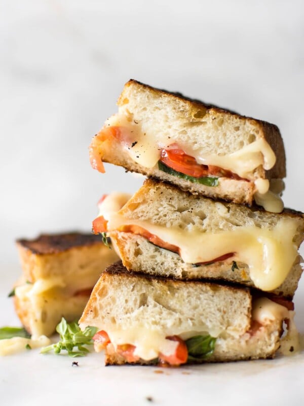 This gourmet Caprese grilled cheese sandwich is made with mayo instead of butter to get an ultra-crispy crust! This vegetarian recipe is quick, simple, and tasty comfort food. A healthier take on grilled cheese with tomatoes, basil, and fresh mozzarella. 