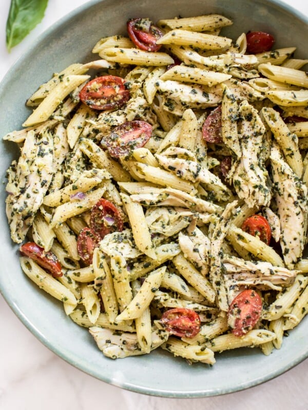 This healthy cold pesto pasta salad with chicken is simple to make and bursting with the fresh taste of basil and tomatoes. 