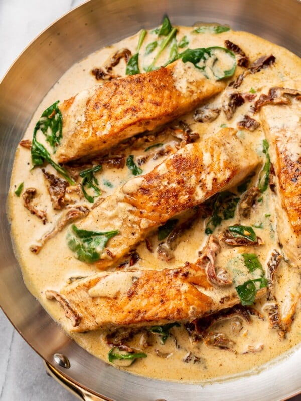 close-up of creamy Tuscan salmon in a skillet