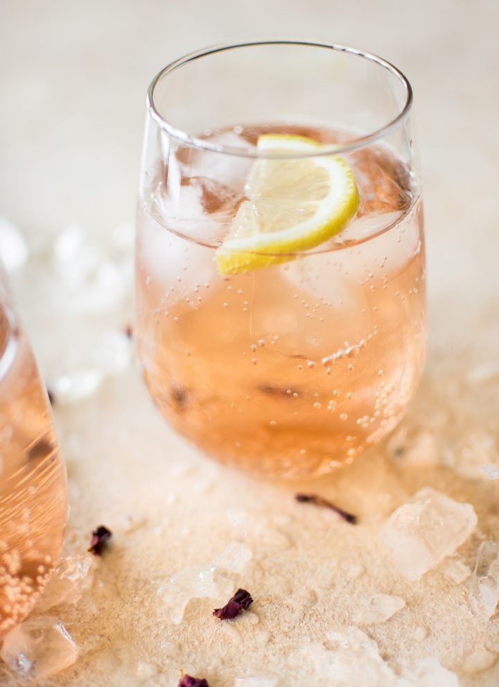 This easy, low-calorie rosé wine spritzer recipe makes the best summer drink. This blush skinny drink is made with sparkling club soda. It's perfect for girls' night or party! 