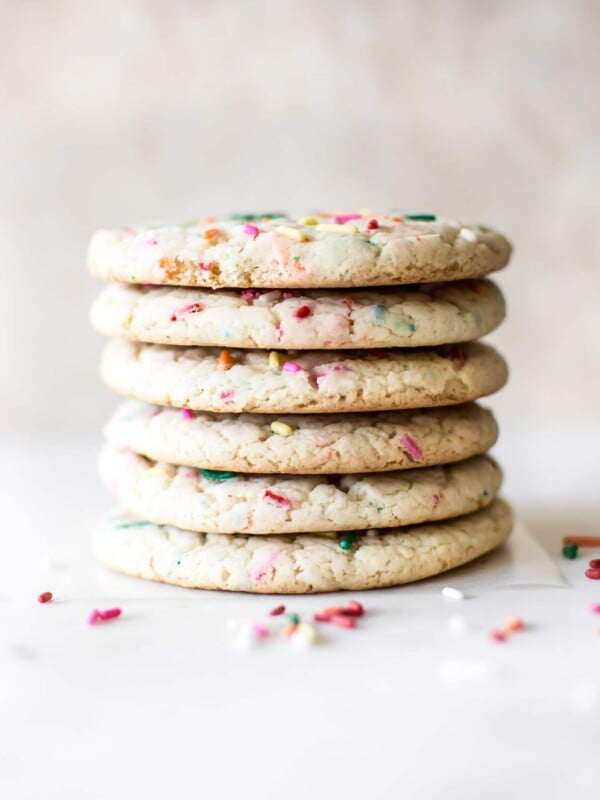 These soft funfetti cookies are made from cake mix, so they're super easy and fast. These are the best simple chewy rainbow sprinkle cookies!