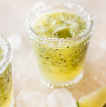 This refreshing blended kiwi margarita is a delicious easy summer drink recipe that's not too sweet.