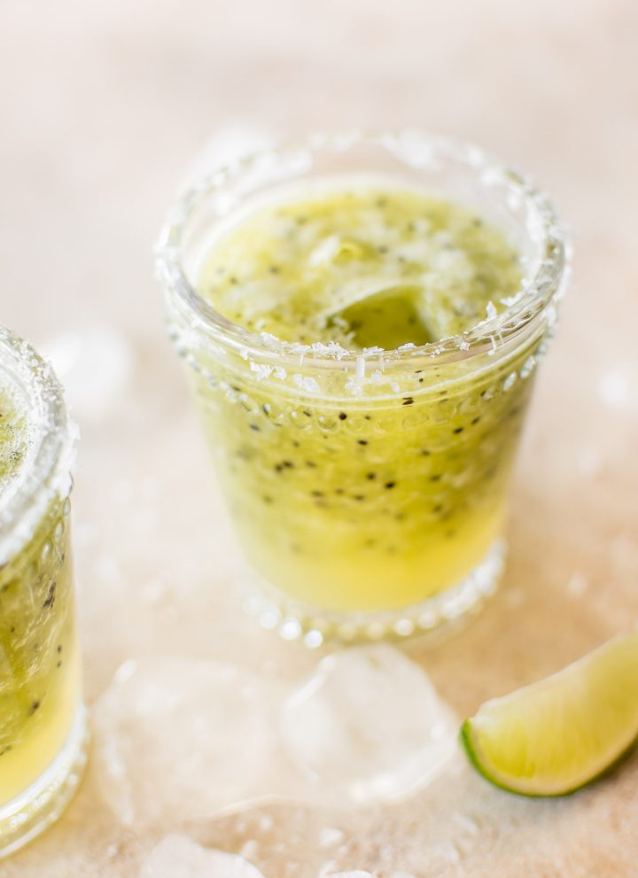 This refreshing blended kiwi margarita is a delicious easy summer drink recipe that's not too sweet.