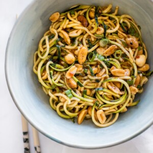 These low-carb Kung Pao zoodles are a healthy stir fry recipe that's ready in 15 minutes. You will love how the spicy sauce coats the zucchini noodles and peanuts in amazing flavor. 