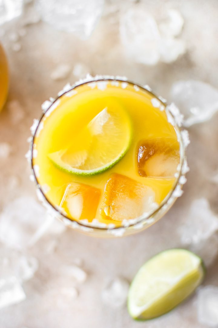 close-up of salt rim on mango margarita glass
