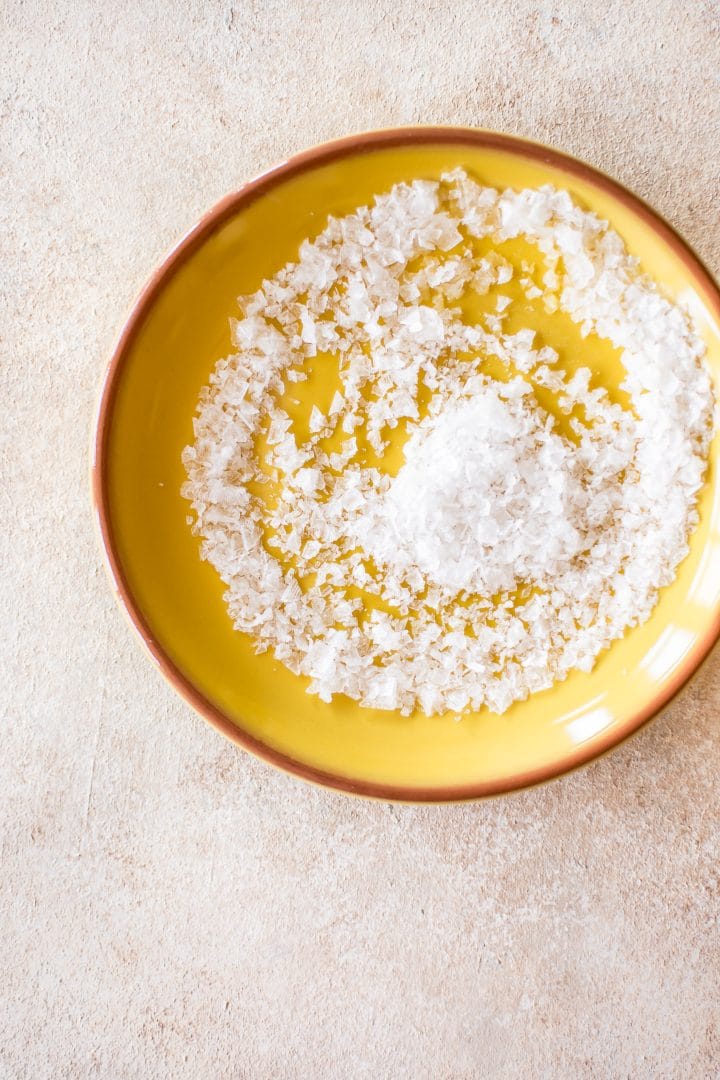 plate with salt for rimming mango margarita glasses