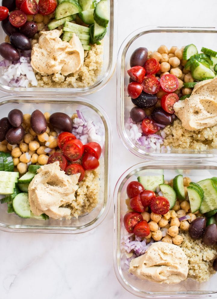 These simple, healthy, and delicious Mediterranean vegan meal prep bowls have quinoa, chickpeas, hummus, and an assortment of veggies. Easily prepare meals for the week with this recipe! Makes a tasty clean eating lunch or dinner.