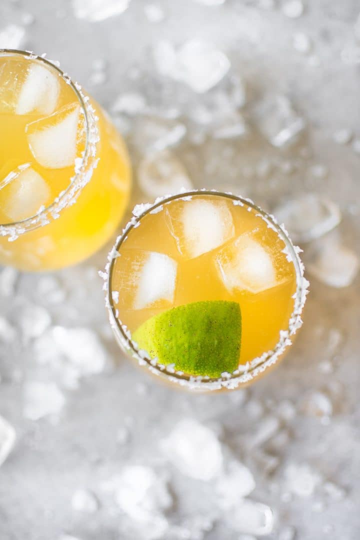 close-up of salt rim on passion fruit margarita glass