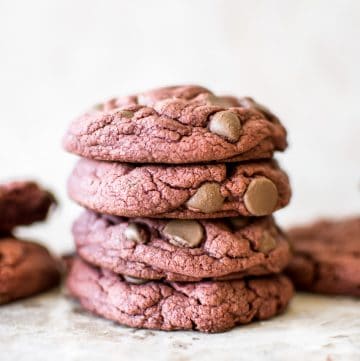 Soft, chewy, easy 3-ingredient (chocolate chips optional) red velvet cake mix cookies are quick and delicious. Perfect for Valentine's Day, Christmas, or any occasion. Duncan Hines boxed cake mix makes the best cookies!