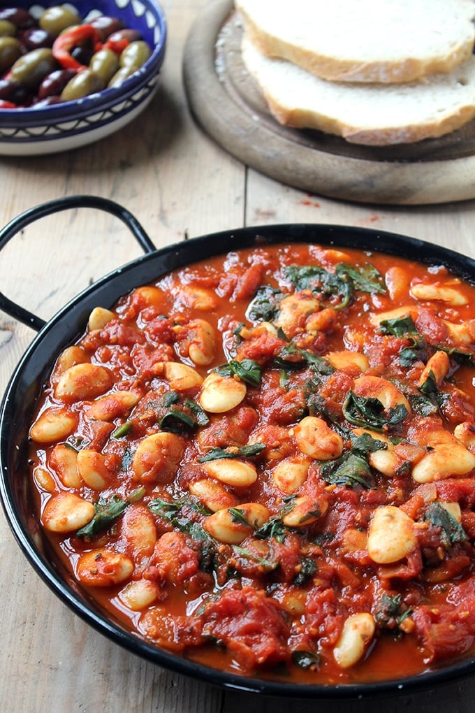 spanish beans with tomatoes in a skillet