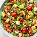 a bowl of avocado bacon salad