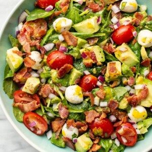 a bowl of avocado bacon salad