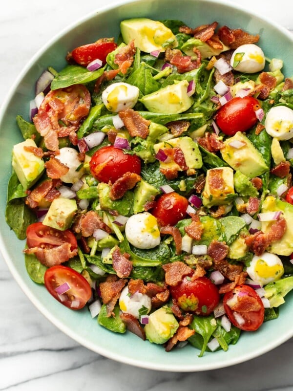 a bowl of avocado bacon salad