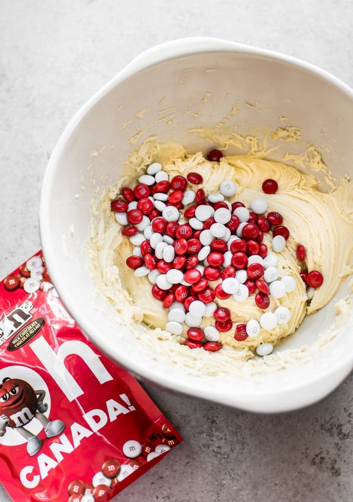 mixing bowl with cookie dough and red and white Canada Day M&M's