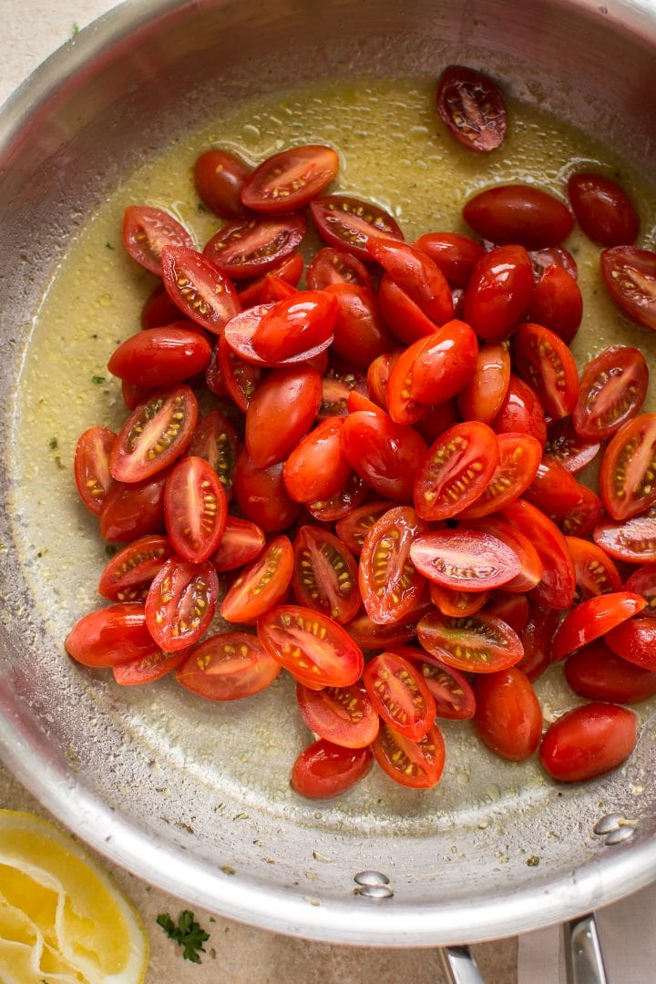 close-up of fresh grape tomatoes in skillet