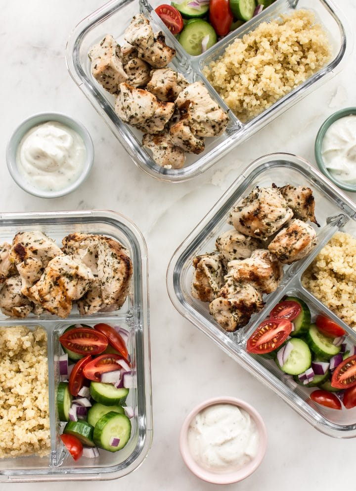 This easy Greek grilled chicken meal prep bowl recipe makes healthy lunches for the week! Quinoa, vegetables, and plenty of garlic make these bowls really tasty. 