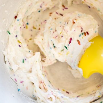This homemade funfetti frosting recipe is perfect for icing cookies, cupcakes, or other sweet treats. It's wonderful for kids' birthday parties!