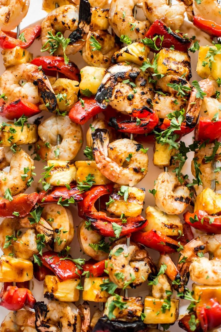 close-up of Hawaiian shrimp skewers with pineapple and red peppers