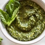 Wondering how to make pesto sauce from scratch? It's easy! This fresh basil pesto recipe is perfect for pasta or chicken dinners or even as a dip for bread.