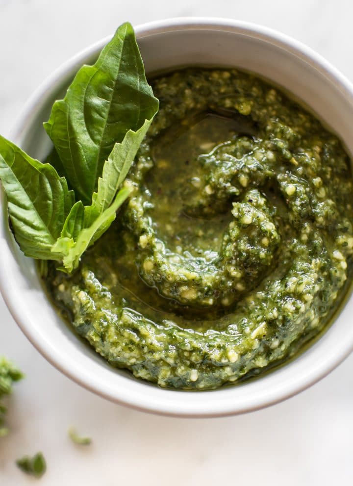 Wondering how to make pesto sauce from scratch? It's easy! This fresh basil pesto recipe is perfect for pasta or chicken dinners or even as a dip for bread.