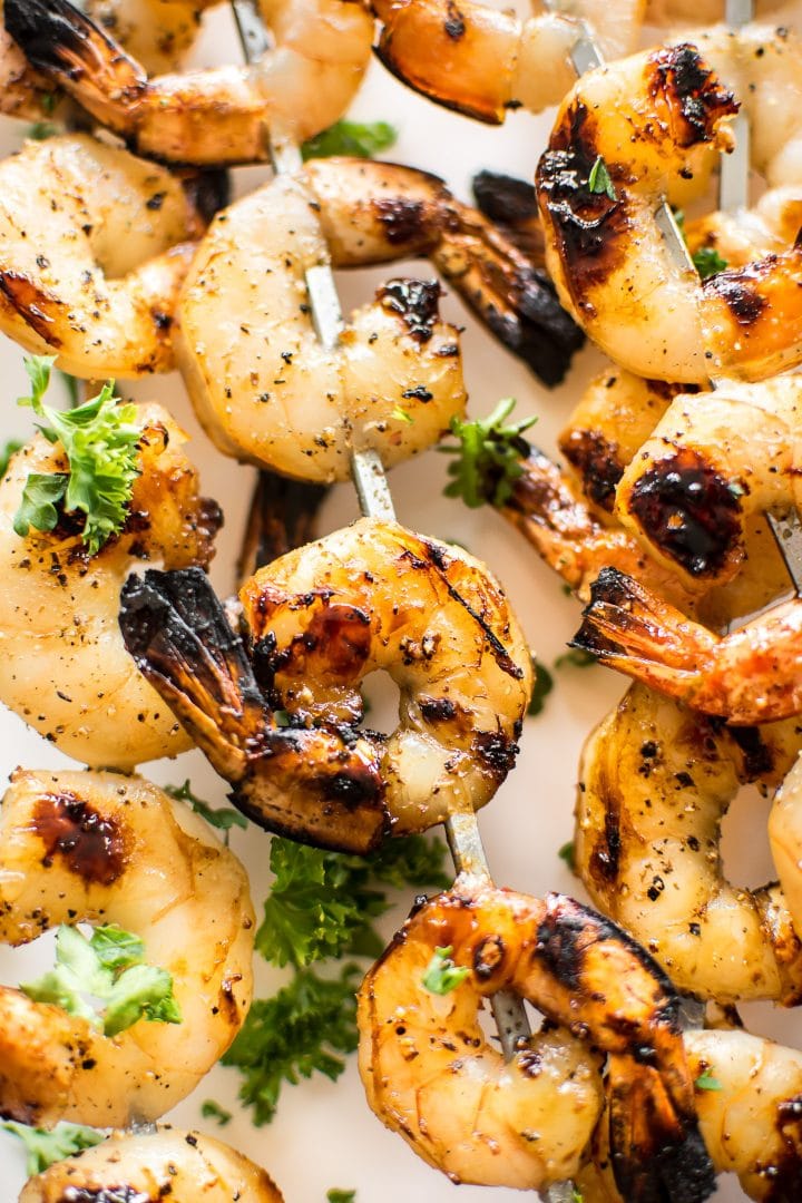 close-up of honey garlic grilled shrimp on a skewer