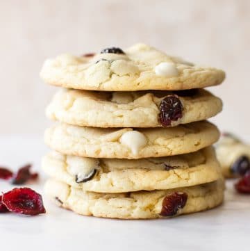 These easy white chocolate cranberry cookies are perfect for Christmas. Bake these for a holiday party or cookie exchange! They're made using yellow cake mix, so they're simple and take way less time than baking from scratch.