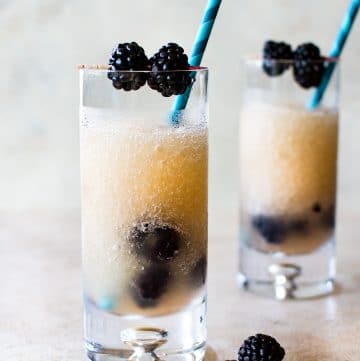 This frozen Riesling (Friesling) recipe is a tasty white wine slushy drink that will help you cool off all summer. It's infused with Chambord (a raspberry-blackberry liqueur) and fresh blackberries. Perfect for summer entertaining, parties, and girls' night!