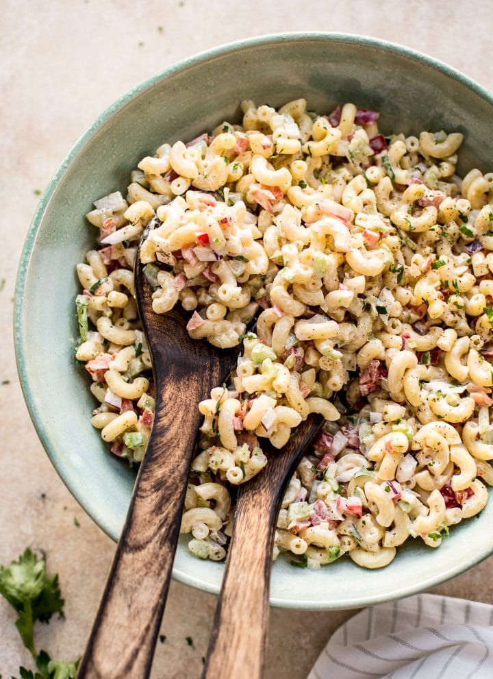 This classic macaroni salad is super easy to make! It's the best old fashioned creamy potluck salad. It has a vegetarian base that's perfect for adding extra protein if needed.