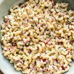 This classic macaroni salad is super easy to make! It's the best old fashioned creamy potluck salad. It has a vegetarian base that's perfect for adding extra protein if needed.