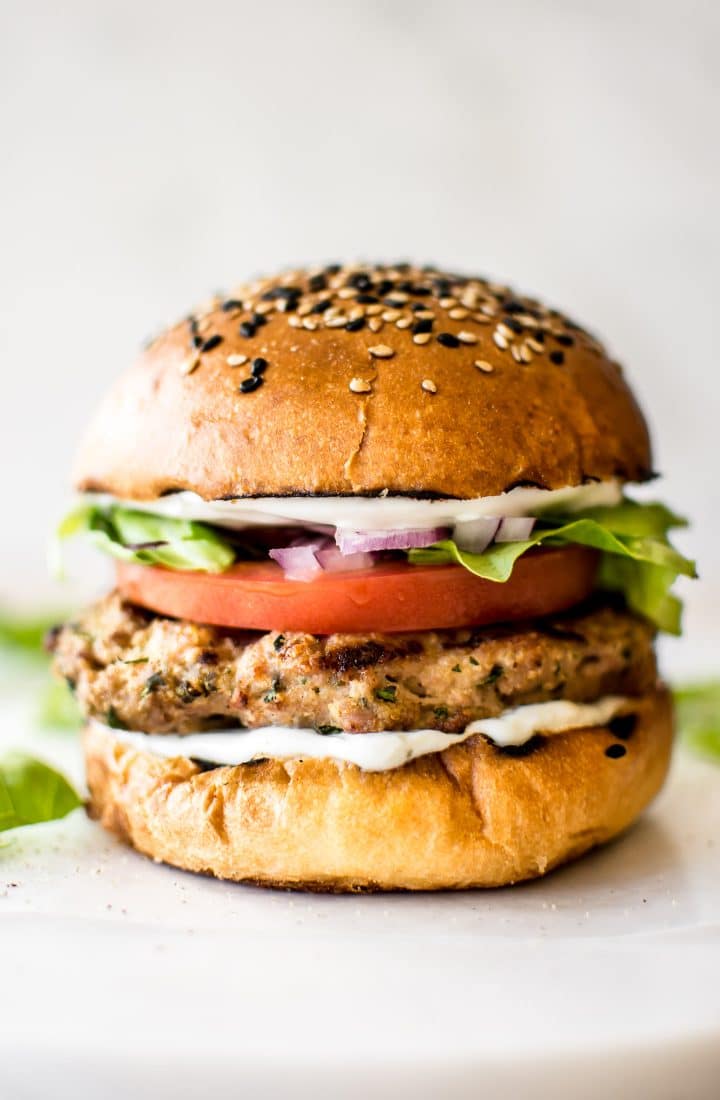 close-up of easy ground turkey burger with lettuce and tomato on a bun
