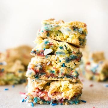 These red, white, and blue patriotic fireworks cookie bars with white chocolate and funfetti sprinkles are a kid-friendly Fourth of July dessert that's simple to make. You will love this awesome recipe to show your American pride!