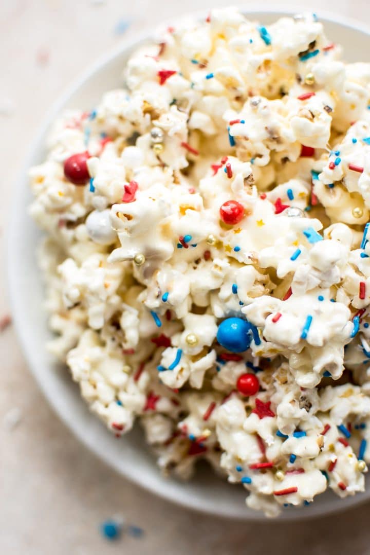 close-up of patriotic marshmallow popcorn with red, white, and blue sprinkles