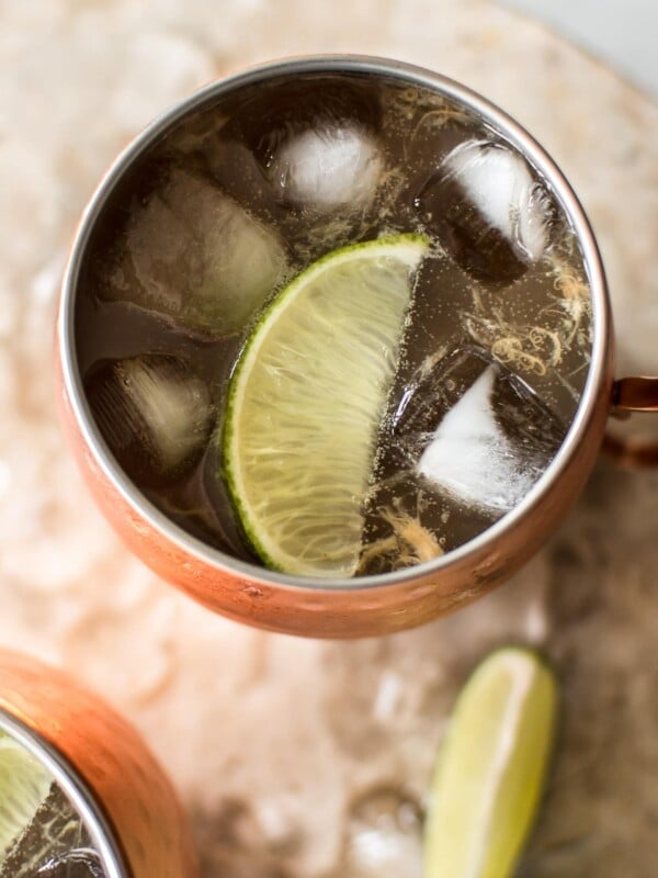 Rhubarb Moscow mule: a summery variation of the classic cocktail. Want to find a way to use up extra rhubarb juice? This is your drink recipe! Perfect for parties.