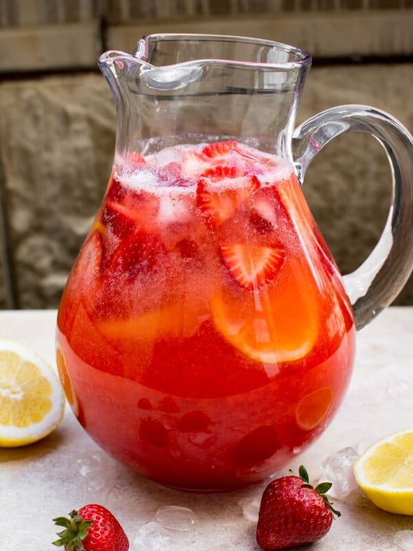 This easy homemade strawberry lemonade is made from fresh summer strawberries. It's a perfect mocktail as-is, but you can make it an alcoholic punch by adding vodka, moscato, or champagne. Or make it sparkling with club soda!