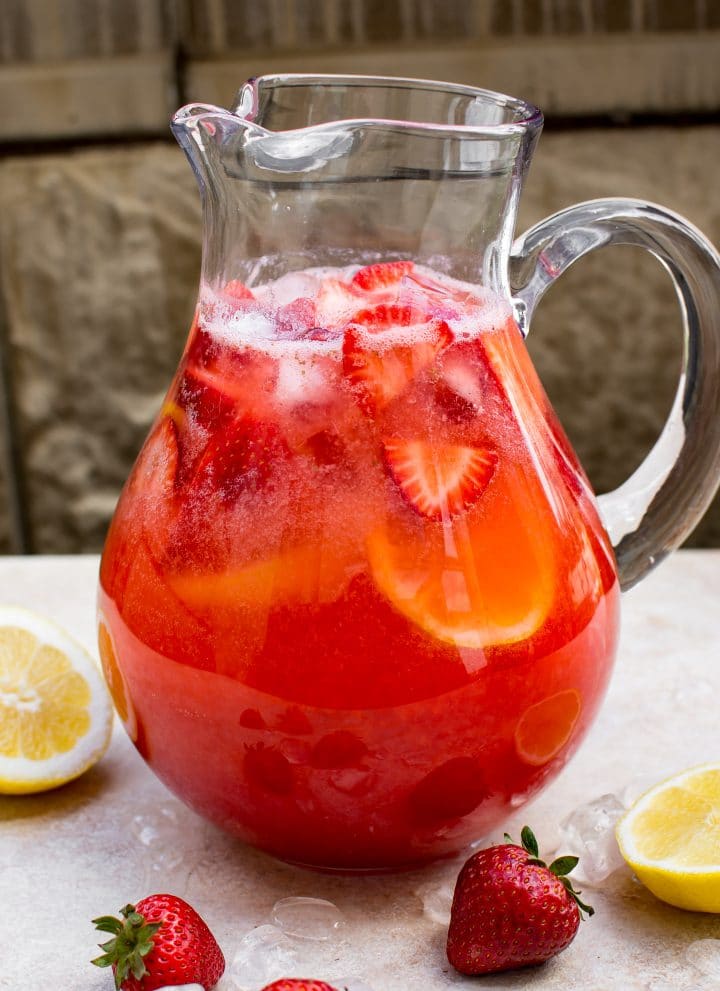 This easy homemade strawberry lemonade is made from fresh summer strawberries. It's a perfect mocktail as-is, but you can make it an alcoholic punch by adding vodka, moscato, or champagne. Or make it sparkling with club soda!
