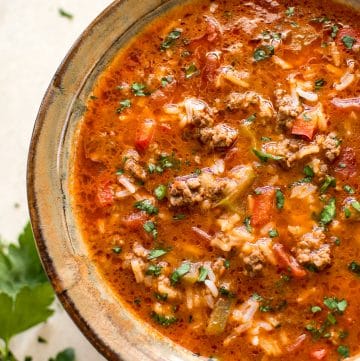 This is the best easy and healthy stuffed pepper soup recipe! It comes together fast and can be made either on the stovetop or in the Crockpot. A family favorite.