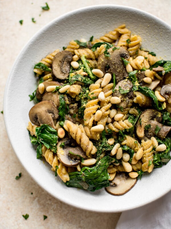 This healthy vegan spinach and mushroom pasta is quick and delicious comfort food dinner. Ready in about 20 minutes!